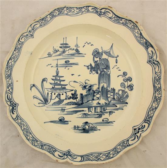 English creamware dish and an English Delft plate, late 18th century,(-)